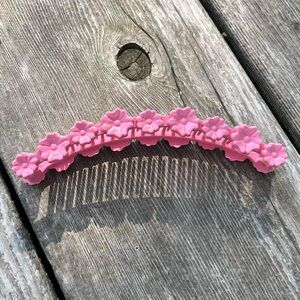 pink plastic flower designed banana hair clip